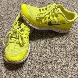 Neon yellow Nike free 5.0